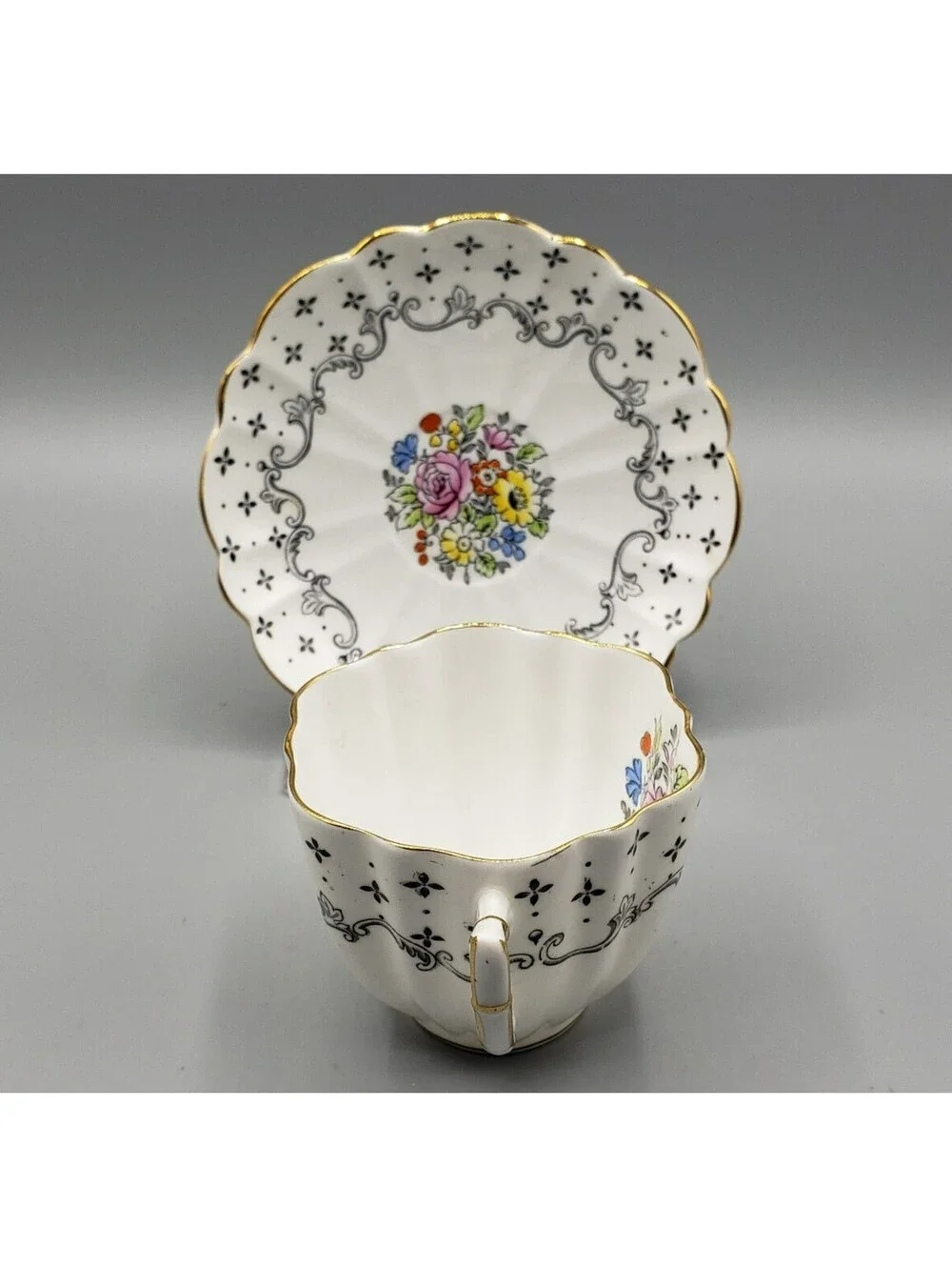 VTG Victoria C&E Teacup & Saucer Black Pattern Flower Medallion England Dainty